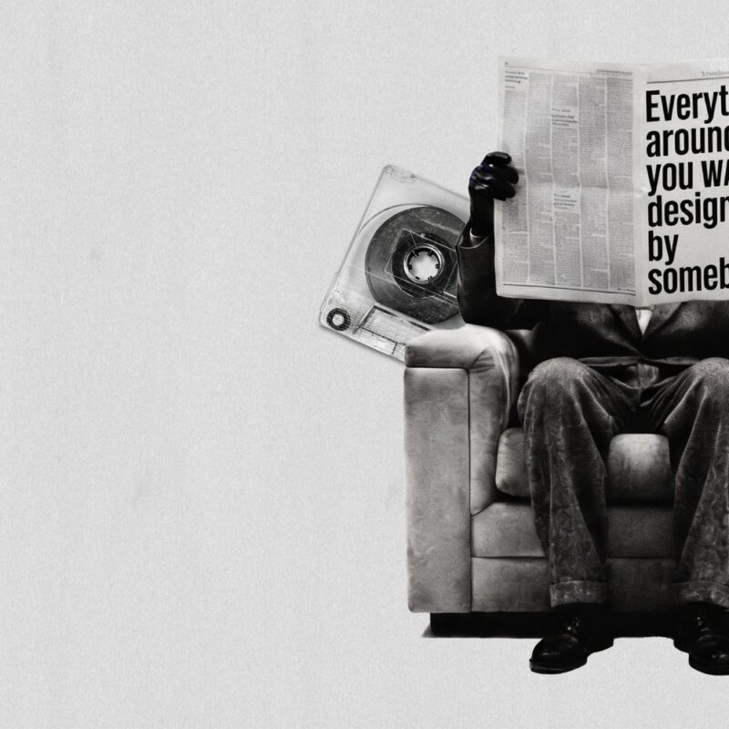 A man in an armchair hides behind a newspaper reading "Everything around you was designed by somebody" — AGSketches Decisions